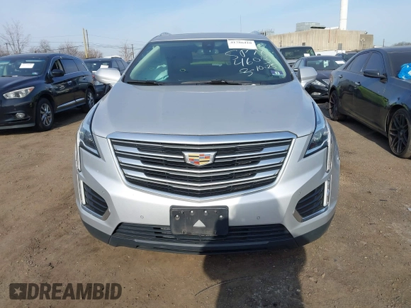 2019 Cadillac XT5 Premium Luxury AWD z VIN 1GYKNFRS2KZ227166, wystawiony jako IAAI lot #41786410 z przebiegiem 99 576 mil mil oraz . Historia ofert i sprzedaży dostępna na DreamBid. Obrazek 12.