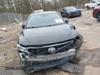 2019 Toyota Camry LE z VIN 4T1B11HK7KU774951, wystawiony jako IAAI lot #41349009 z przebiegiem 189 711 mil mil oraz . Historia ofert i sprzedaży dostępna na DreamBid. Obrazek 13.