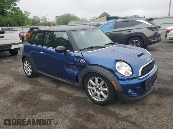 2013 MINI Hardtop S with VIN WMWSV3C55DT387777, listed as a Copart auction lot 56495215 with 53,033 mi miles and Salvage title. Bid and sale history available at DreamBid. Image 4.