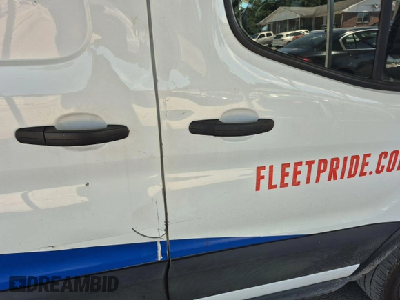 2020 Ford Transit Cargo z VIN 1FTYE1C89LKA17335, wystawiony jako IAAI lot #42561511 z przebiegiem 276 728 mil mil oraz . Historia ofert i sprzedaży dostępna na DreamBid. Obrazek 8.