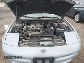 1995 Ford Probe z VIN 1ZVLT20A6S5154983, wystawiony jako IAAI lot #42301574 z przebiegiem 128 515 mil mil oraz . Historia ofert i sprzedaży dostępna na DreamBid. Obrazek 10.