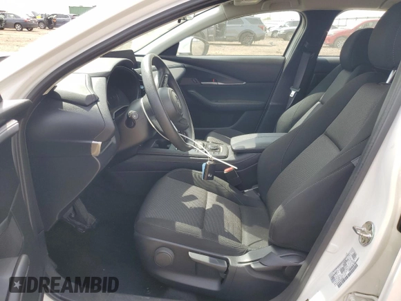 2023 Mazda CX-30 S with VIN 3MVDMBAMXPM586909, listed as a Copart auction lot 55889535 with 21,057 mi miles and Salvage title. Bid and sale history available at DreamBid. Image 7.
