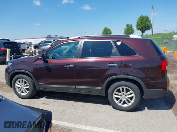 2015 Kia Sorento LX with VIN 5XYKTDA70FG604220, listed as a IAAI auction lot 42060598 with 128,180 mi miles and . Bid and sale history available at DreamBid. Image 14.