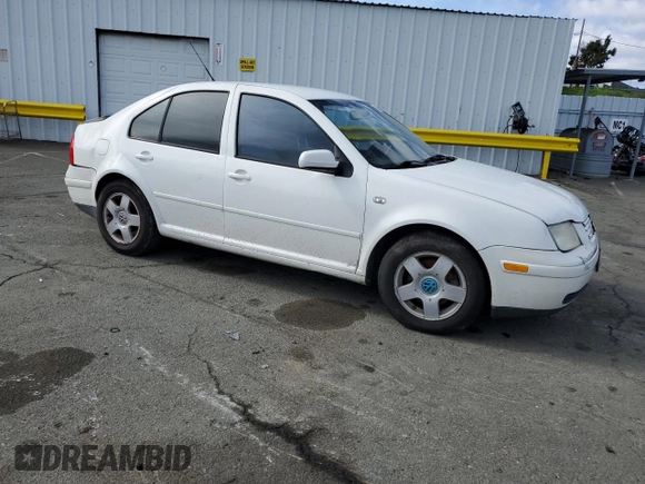 2002 Volkswagen Jetta GL с VIN 3VWRK69M52M024396, выставлен на аукционе Copart как лот 45539355 с пробегом 142 880 миль миль и Списание • Salvage title. История ставок и продаж доступна на DreamBid. Изображение 4.