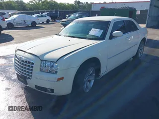 2008 Chrysler 300 Touring with VIN 2C3LA53G88H182994, listed as a IAAI auction lot 42097976 with 204,844 mi miles. Bid and sale history available at carsss.com. Image 2.