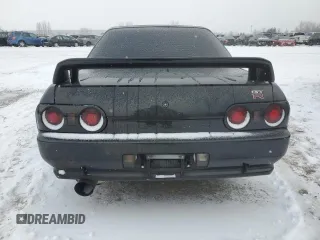 1991 Nissan Skyline z VIN BNR32016641, wystawiony jako Copart lot #87935775 z przebiegiem 166 776 mil mil oraz Szkoda całkowita • Salvage title. Historia ofert i sprzedaży dostępna na DreamBid. Obrazek 6.