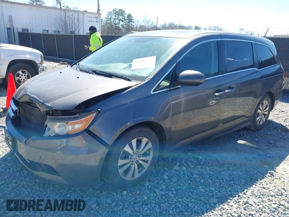 2014 Honda Odyssey EX-L with VIN 5FNRL5H61EB014695, listed as a IAAI auction lot 41694860 with 261,265 mi miles and . Bid and sale history available at DreamBid. Image 17.