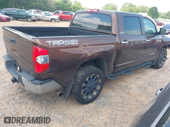 2014 Toyota Tundra Limited with VIN 5TFHW5F19EX400636, listed as a IAAI auction lot 42626818 with 267,402 mi miles and . Bid and sale history available at DreamBid. Image 4.