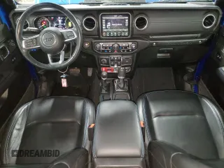 2022 Jeep Wrangler Unlimited Rubicon with VIN 1C4JJXR69NW190564, listed as a Copart auction lot 83703504 with 16,803 mi miles and Salvage title. Bid and sale history available at DreamBid. Image 8.