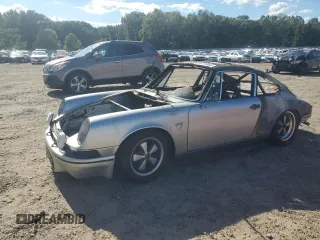 1974 Porsche 911 with VIN 9114300849, listed as a Copart auction lot 64270483 with Not provided miles and Salvage title. Bid and sale history available at DreamBid. Image 1.