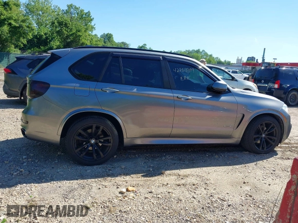 2014 BMW X5 xDrive35i z VIN 5UXKR0C5XE0K42788, wystawiony jako IAAI lot #42263399 z przebiegiem 138 644 mil mil oraz . Historia ofert i sprzedaży dostępna na DreamBid. Obrazek 13.
