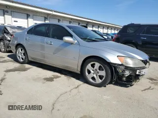2007 Acura RL Technology z VIN JH4KB16677C001125, wystawiony jako Copart lot #46943485 z przebiegiem 191 097 mil mil oraz Szkoda całkowita • Salvage title. Historia ofert i sprzedaży dostępna na DreamBid. Obrazek 4.