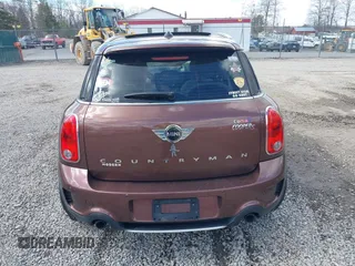 2016 MINI Countryman S z VIN WMWZC5C55GWU01180, wystawiony jako IAAI lot #41874470 z przebiegiem 194 997 mil mil oraz . Historia ofert i sprzedaży dostępna na DreamBid. Obrazek 16.