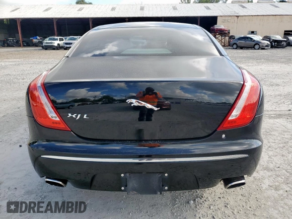 2012 Jaguar XJ XJL with VIN SAJWA2GB7CLV37656, listed as a Copart auction lot 62450905 with 88,954 mi miles and Salvage title. Bid and sale history available at DreamBid. Image 6.