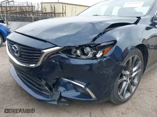2016 Mazda Mazda6 i Grand Touring with VIN JM1GJ1W57G1486962, listed as a IAAI auction lot 41813471 with 64,078 mi miles. Bid and sale history available at carsss.com. Image 6.