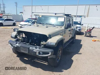 2020 Jeep Gladiator Sport S with VIN 1C6HJTAG1LL173646, listed as a IAAI auction lot 42008807 with Not Provided miles. Bid and sale history available at carsss.com. Image 2.