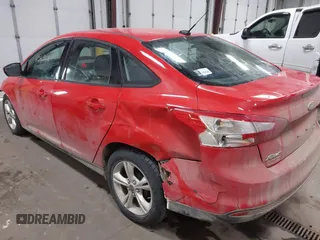 2013 Ford Focus SE z VIN 1FADP3F20DL352710, wystawiony jako IAAI lot #41549408 z przebiegiem 97 460 mil mil oraz . Historia ofert i sprzedaży dostępna na DreamBid. Obrazek 3.