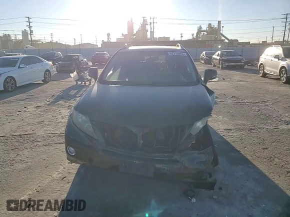 2012 Lexus RX 450h with VIN JTJBC1BA3C2433751, listed as a Copart auction lot 82713884 with 144,139 mi miles and Salvage Title. Bid and sale history available at DreamBid. Image 11.