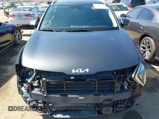 2023 Kia Sportage EX with VIN KNDPVCAG8P7019572, listed as a IAAI auction lot 42226335 with 68,583 mi miles and . Bid and sale history available at DreamBid. Image 13.