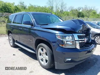 2018 Chevrolet Tahoe LT with VIN 1GNSCBKC0JR138385, listed as a IAAI auction lot 41977300 with 104,987 mi miles and . Bid and sale history available at DreamBid. Image 1.