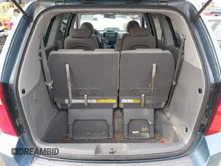 2010 Kia Sedona LX with VIN KNDMG4C34A6324741, listed as a IAAI auction lot 41665347 with 135,904 mi miles. Bid and sale history available at carsss.com. Image 18.