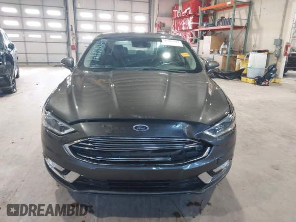 2017 Ford Fusion Titanium with VIN 3FA6P0SU2HR162865, listed as a IAAI auction lot 41981344 with 79,618 mi miles and . Bid and sale history available at DreamBid. Image 12.