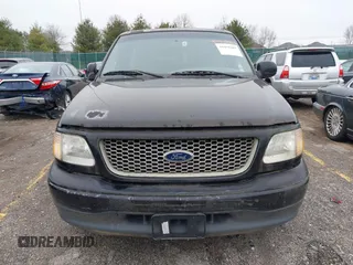 2001 Ford F-150 XL with VIN 2FTZF07211CA54107, listed as a IAAI auction lot 41450483 with 153,699 mi miles. Bid and sale history available at carsss.com. Image 6.