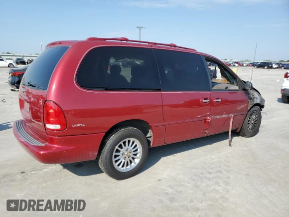 1999 Chrysler Town & Country LXi with VIN 1C4GP64L0XB536320, listed as a Copart auction lot 74194134 with Not Provided miles and Salvage Title. Bid and sale history available at carsss.com. Image 3.