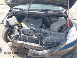 2010 Mazda 5 Sport with VIN JM1CR2WLXA0374147, listed as a IAAI auction lot 41776190 with 155,618 mi miles and . Bid and sale history available at DreamBid. Image 10.