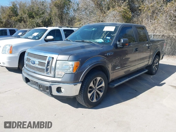 2012 Ford F-150 XL with VIN 1FTFW1CT8CFC77226, listed as a IAAI auction lot 41385304 with 226,191 mi miles. Bid and sale history available at carsss.com. Image 2.