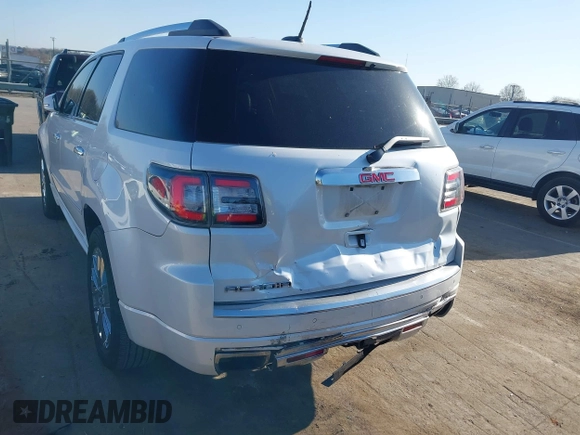 2016 GMC Acadia Denali with VIN 1GKKRTKD4GJ257624, listed as a IAAI auction lot 41769196 with 129,229 mi miles. Bid and sale history available at carsss.com. Image 6.