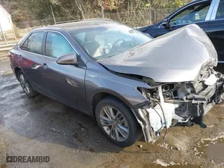 2015 Toyota Camry Hybrid LE with VIN 4T1BD1FK5FU164384, listed as a IAAI auction lot 41704922 with 122,132 mi miles. Bid and sale history available at carsss.com. Image 1.