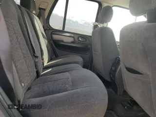 2006 GMC Envoy SLE z VIN 1GKDT13S462156541, wystawiony jako Copart lot #52500615 z przebiegiem 140 558 mil mil oraz Szkody całkowita. Historia ofert i sprzedaży dostępna na DreamBid. Obrazek 12.