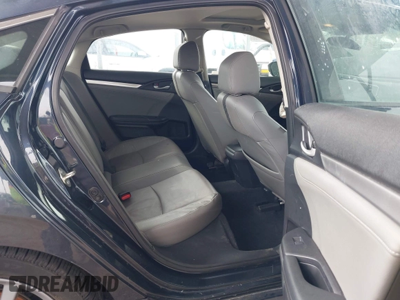 2020 Honda Civic EX-L with VIN 19XFC1F72LE214611, listed as a IAAI auction lot 41629949 with 54,328 mi miles and . Bid and sale history available at DreamBid. Image 8.