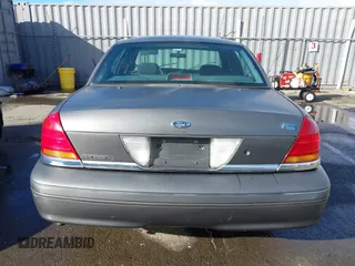 1999 Ford Crown Victoria Police with VIN 2FAFP71W9XX187581, listed as a IAAI auction lot 41522223 with 94,889 mi miles. Bid and sale history available at carsss.com. Image 16.