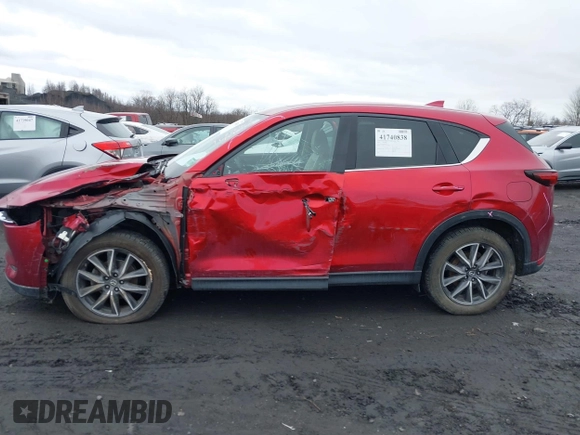 2018 Mazda CX-5 Grand Touring with VIN JM3KFBDM0J0427753, listed as a IAAI auction lot 41740838 with 69,683 mi miles and . Bid and sale history available at DreamBid. Image 14.