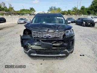 2019 Ford Explorer Platinum z VIN 1FM5K8HT1KGA49601, wystawiony jako Copart lot #56636955 z przebiegiem 56 913 mil mil oraz Szkoda całkowita • Salvage title. Historia ofert i sprzedaży dostępna na DreamBid. Obrazek 14.
