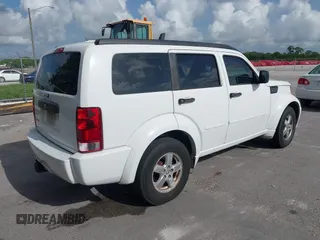 2007 Dodge Nitro SXT z VIN 1D8GT28K17W530705, wystawiony jako IAAI lot #42456213 z przebiegiem 217 175 mil mil oraz . Historia ofert i sprzedaży dostępna na DreamBid. Obrazek 4.