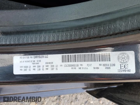 2009 Chrysler Sebring Touring z VIN 1C3LC56D69N531168, wystawiony jako Copart lot #59331415 z przebiegiem 225 463 mil mil oraz Szkoda całkowita • Salvage title. Historia ofert i sprzedaży dostępna na DreamBid. Obrazek 12.