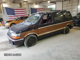 1991 Dodge Caravan z VIN 2B4GK55R0MR223855, wystawiony jako Copart lot #72819484 z przebiegiem Nie podano mil oraz Szkoda całkowita • Salvage title. Historia ofert i sprzedaży dostępna na DreamBid. Obrazek 1.