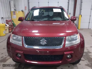 2006 Suzuki Grand Vitara Luxury with VIN JS3TD947264106126, listed as a IAAI auction lot 41961693 with 146,105 mi miles. Bid and sale history available at carsss.com. Image 12.