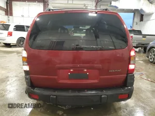 2000 Pontiac Montana z VIN 1GMDU03EXYD365251, wystawiony jako Copart lot #79131854 z przebiegiem 182 527 mil mil oraz Nie do naprawy • Non repairable. Historia ofert i sprzedaży dostępna na DreamBid. Obrazek 6.