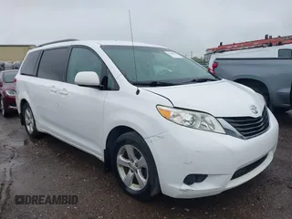 2012 Toyota Sienna LE AAS with VIN 5TDKK3DC3CS208853, listed as a IAAI auction lot 42205012 with 197,286 mi miles. Bid and sale history available at carsss.com. Image 1.