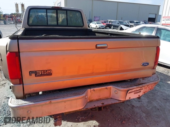 1997 Ford F-350 z VIN 1FTJW35G7VEC80262, wystawiony jako IAAI lot #38286107 z przebiegiem 158 206 mil mil oraz . Historia ofert i sprzedaży dostępna na DreamBid. Obrazek 16.