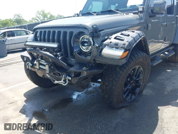 2022 Jeep Gladiator High Altitude with VIN 1C6HJTFG5NL149751, listed as a IAAI auction lot 42257917 with 24,603 mi miles and . Bid and sale history available at DreamBid. Image 6.