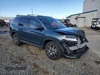 2022 Honda Pilot Touring 7-Passenger with VIN 5FNYF6H64NB011184, listed as a Copart auction lot 44469745 with 18,079 mi miles and Salvage Title. Bid and sale history available at carsss.com. Image 4.