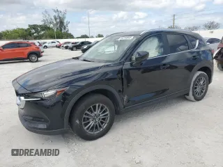 2021 Mazda CX-5 Touring z VIN JM3KFBCM8M1436782, wystawiony jako Copart lot #54144645 z przebiegiem 52 388 mil mil oraz Szkody całkowita. Historia ofert i sprzedaży dostępna na DreamBid. Obrazek 1.