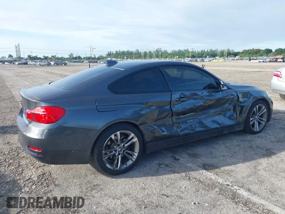 2014 BMW 4 Series 428i xDrive with VIN WBA3N5C57EK196790, listed as a IAAI auction lot 40571670 with 108,114 mi miles and . Bid and sale history available at DreamBid. Image 4.
