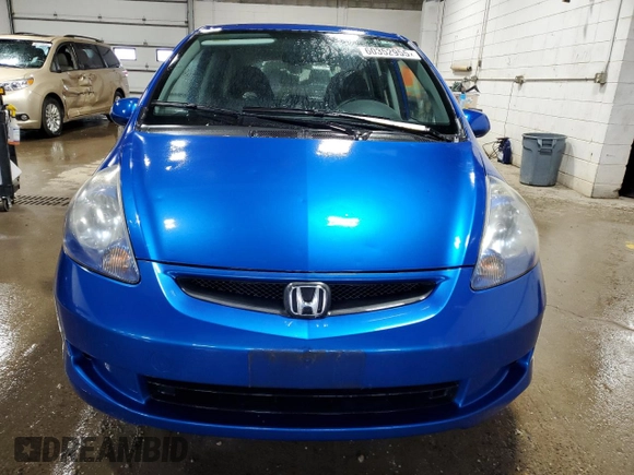 2007 Honda Fit with VIN JHMGD37447S041337, listed as a Copart auction lot 60352955 with 222,726 mi miles and Clean title. Bid and sale history available at DreamBid. Image 5.