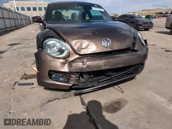 2013 Volkswagen Beetle with VIN 3VWHX7AT8DM603424, listed as a Copart auction lot 51019185 with 136,196 mi miles and Salvage Title. Bid and sale history available at DreamBid. Image 13.